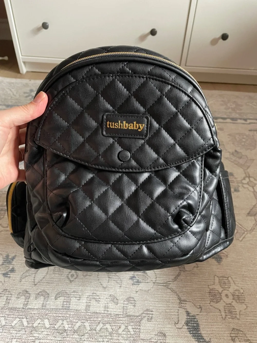 Tushbaby Quilted Black and Gold baby hip carrier